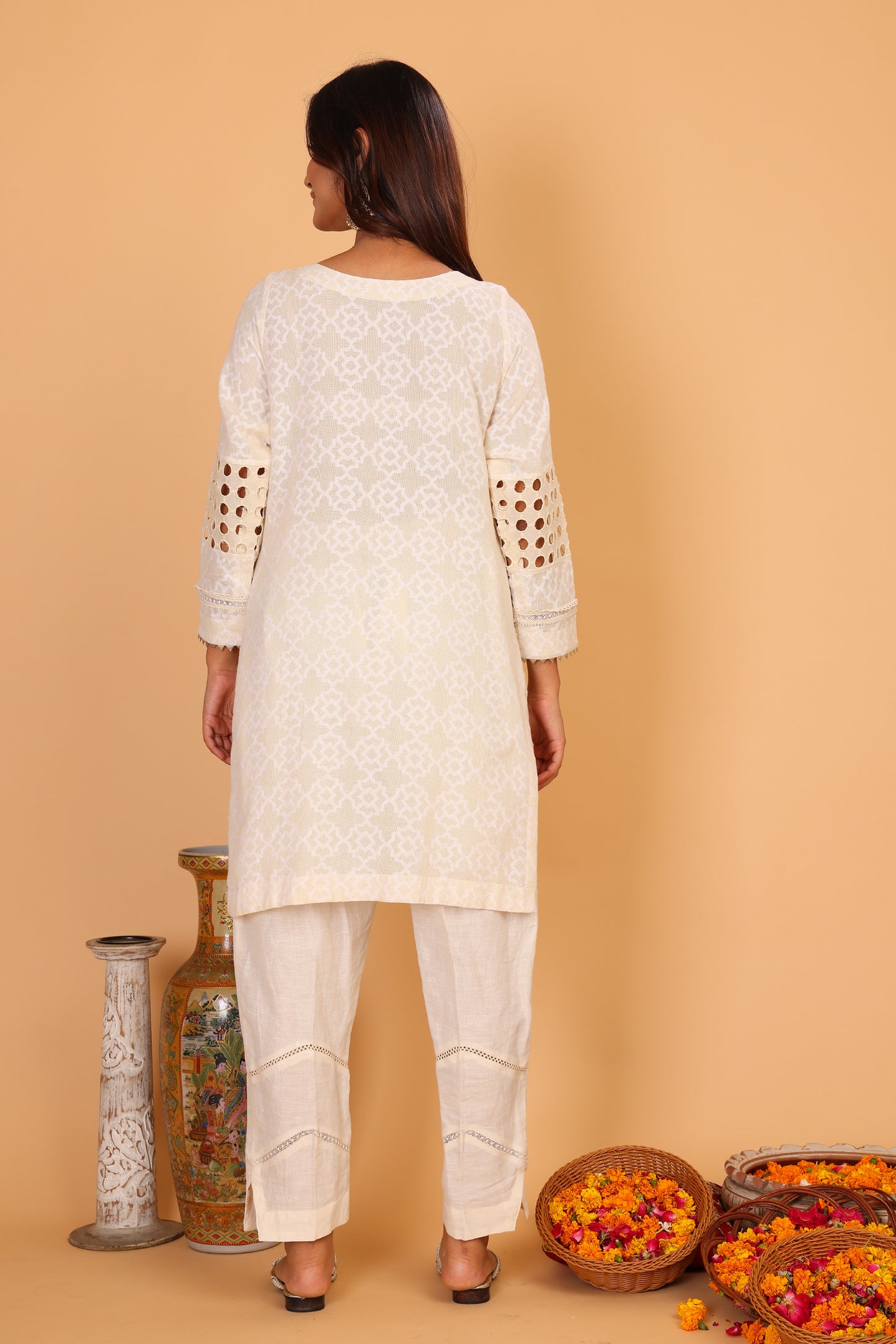 Off white textured kurta with lace detailing and pants