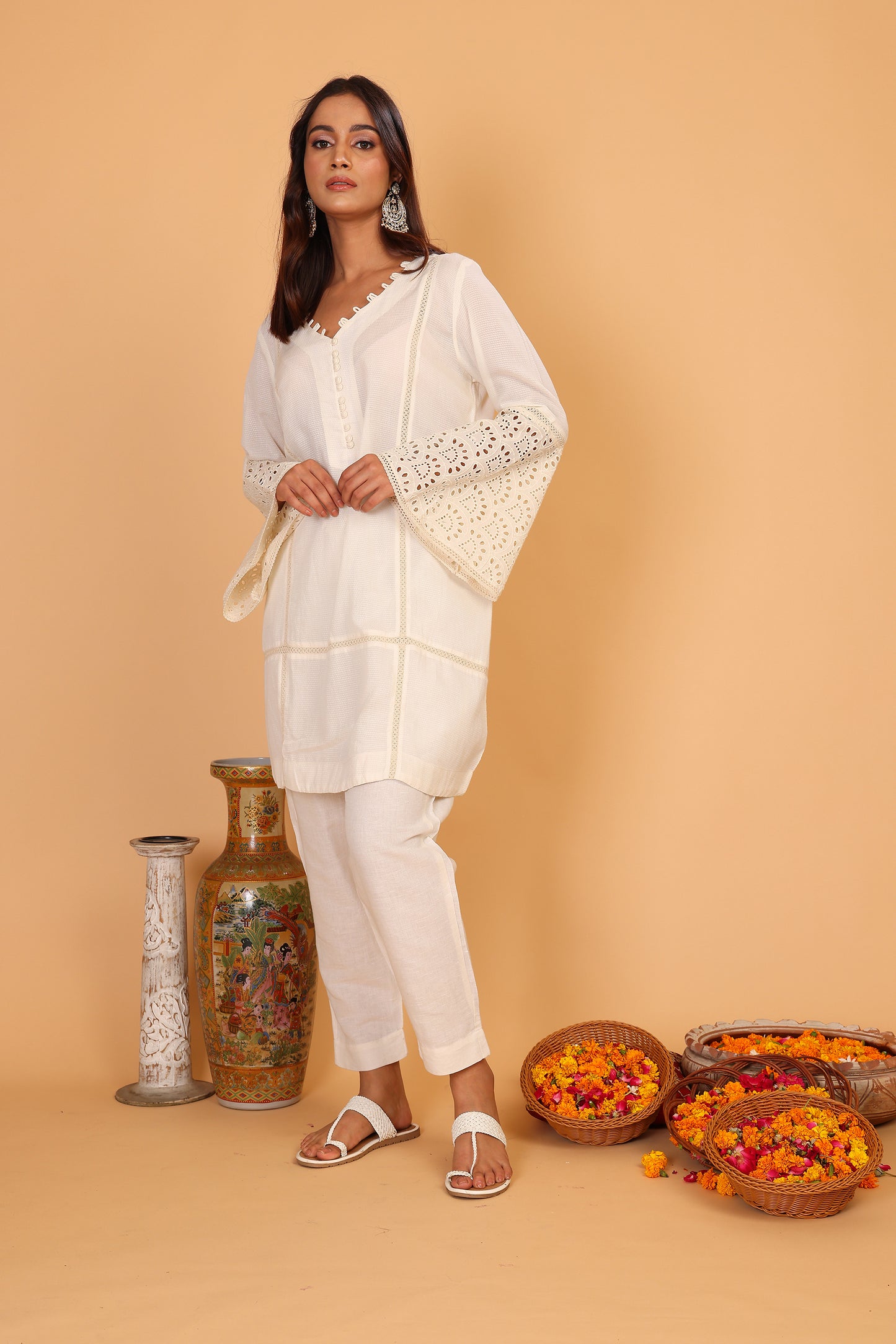 Off white textured kurta with lace detailed sleeves  and pants