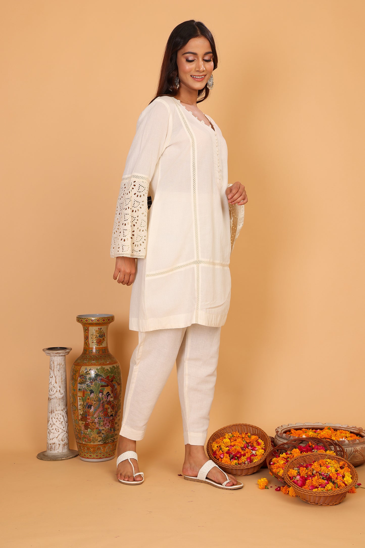 Off white textured kurta with lace detailed sleeves  and pants