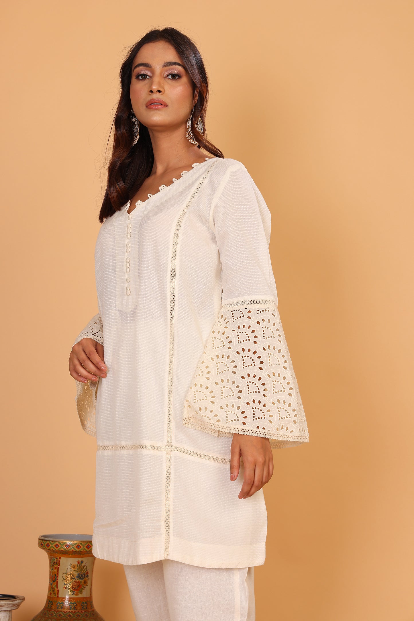 Off white textured kurta with lace detailed sleeves  and pants