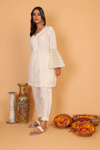 Off white textured kurta with lace detailed sleeves  and pants