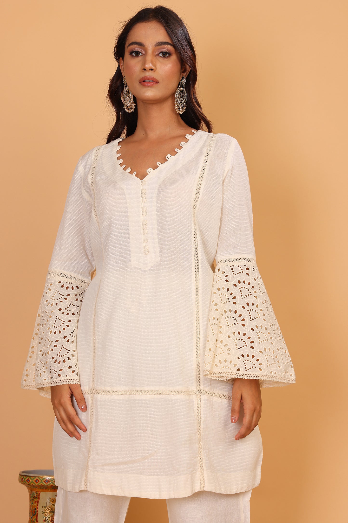 Off white textured kurta with lace detailed sleeves  and pants