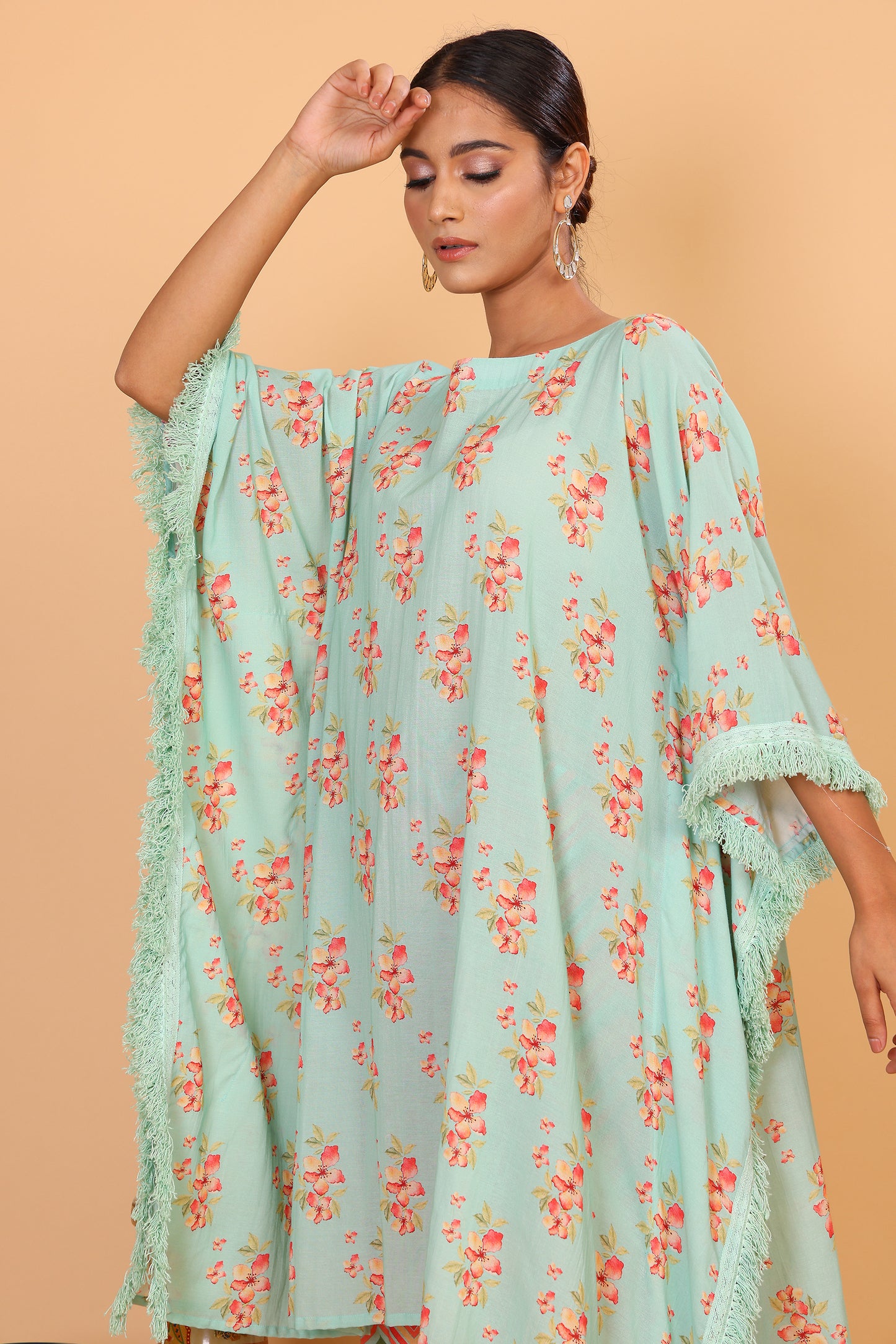 Floral kaftan with fringeing and chevron print pants