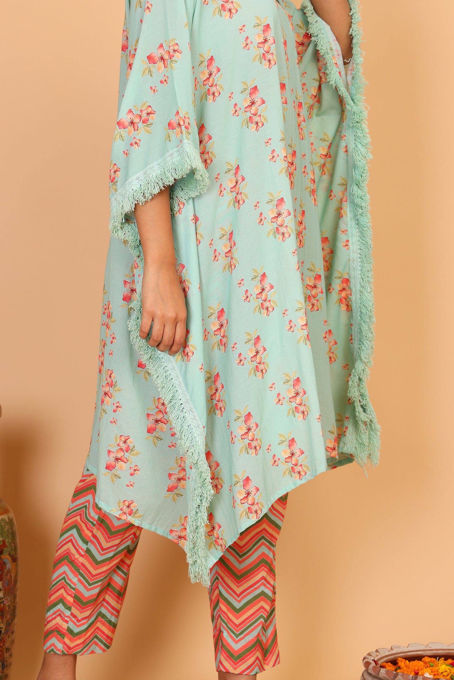 Floral kaftan with fringeing and chevron print pants