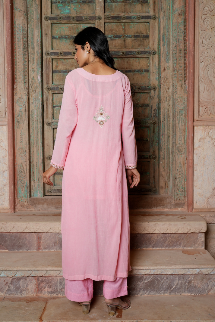 A soft blush-pink kurta Set