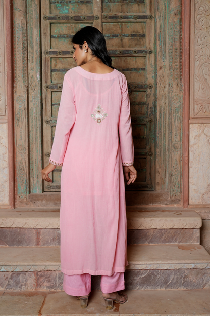 A soft blush-pink kurta Set