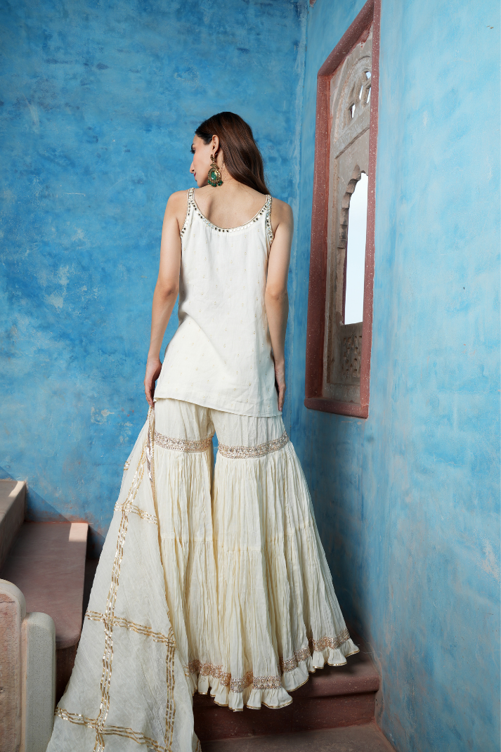 An elegant ivory sharara set