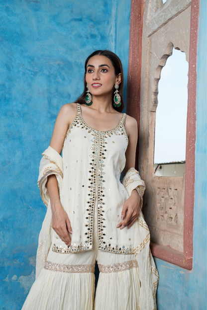 An elegant ivory sharara set
