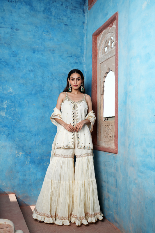 An elegant ivory sharara set