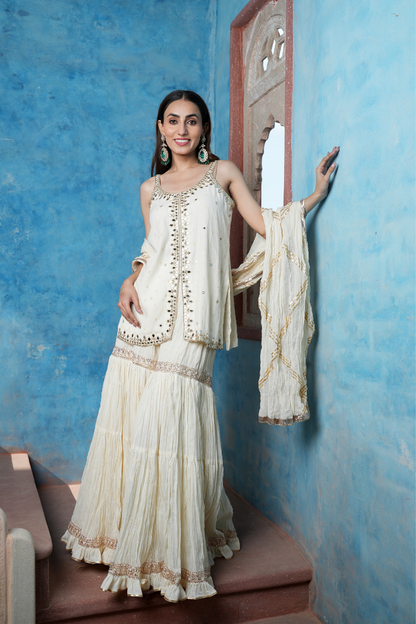 An elegant ivory sharara set
