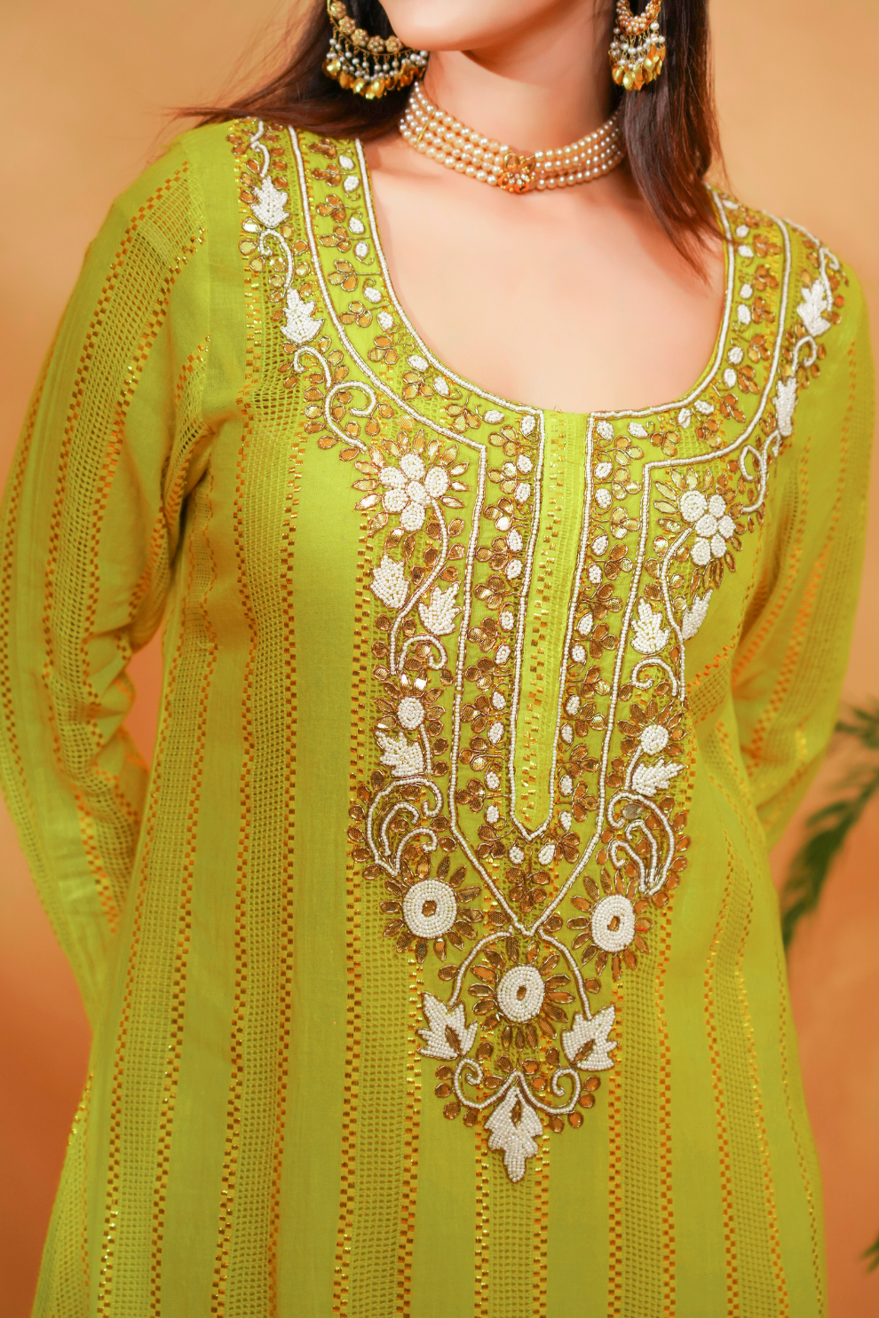 Lime textured kurta with emrboidered neckline