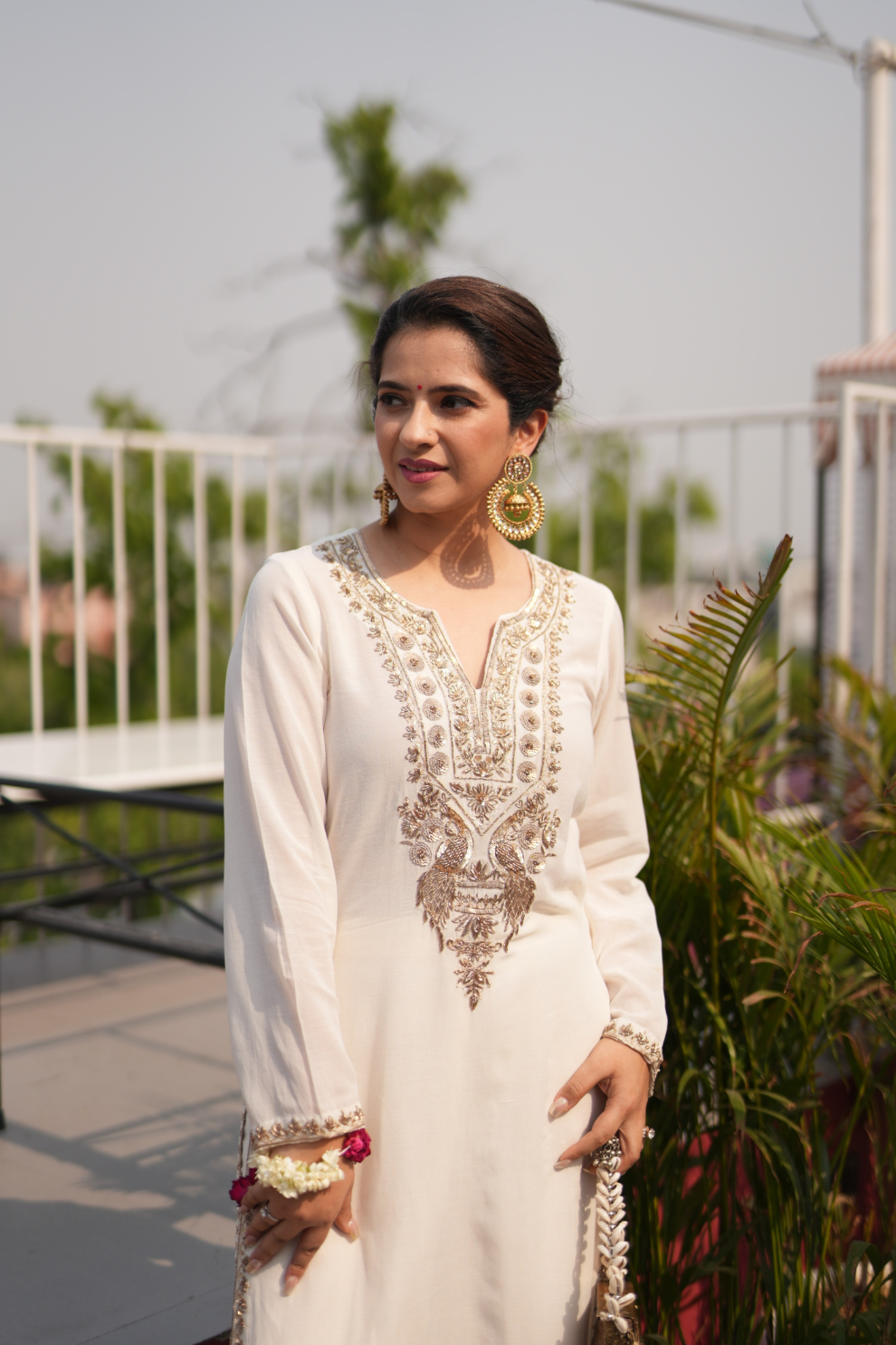 Ivory kurta with embroidered peacocks