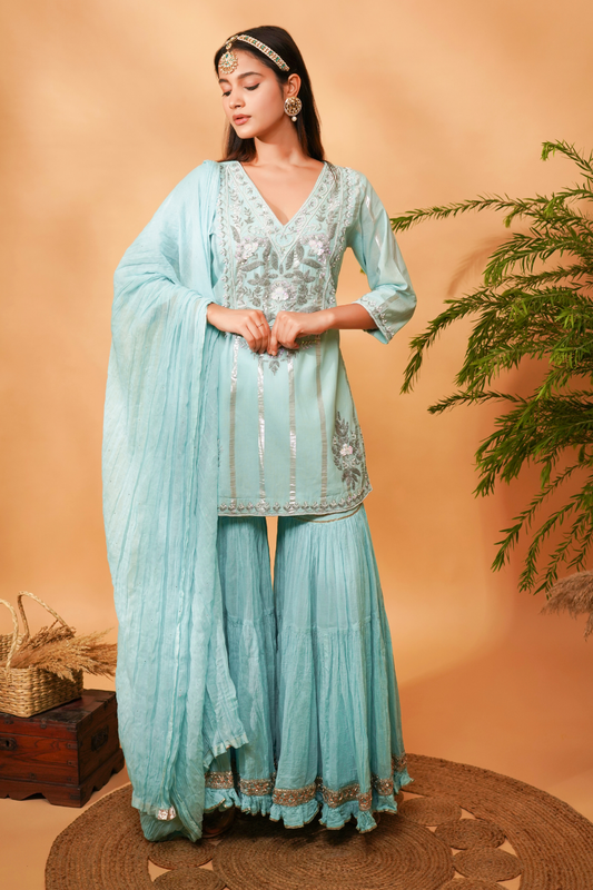 Blue embroidered short kurta paired with a Gharara