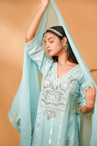 Blue embroidered short kurta paired with a Gharara