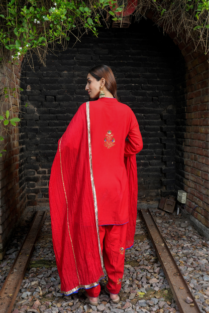 A red kurta with zari embroidery pant