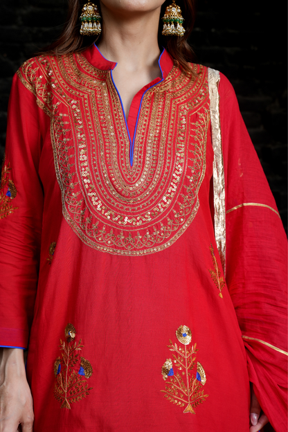 A red kurta with zari embroidery pant