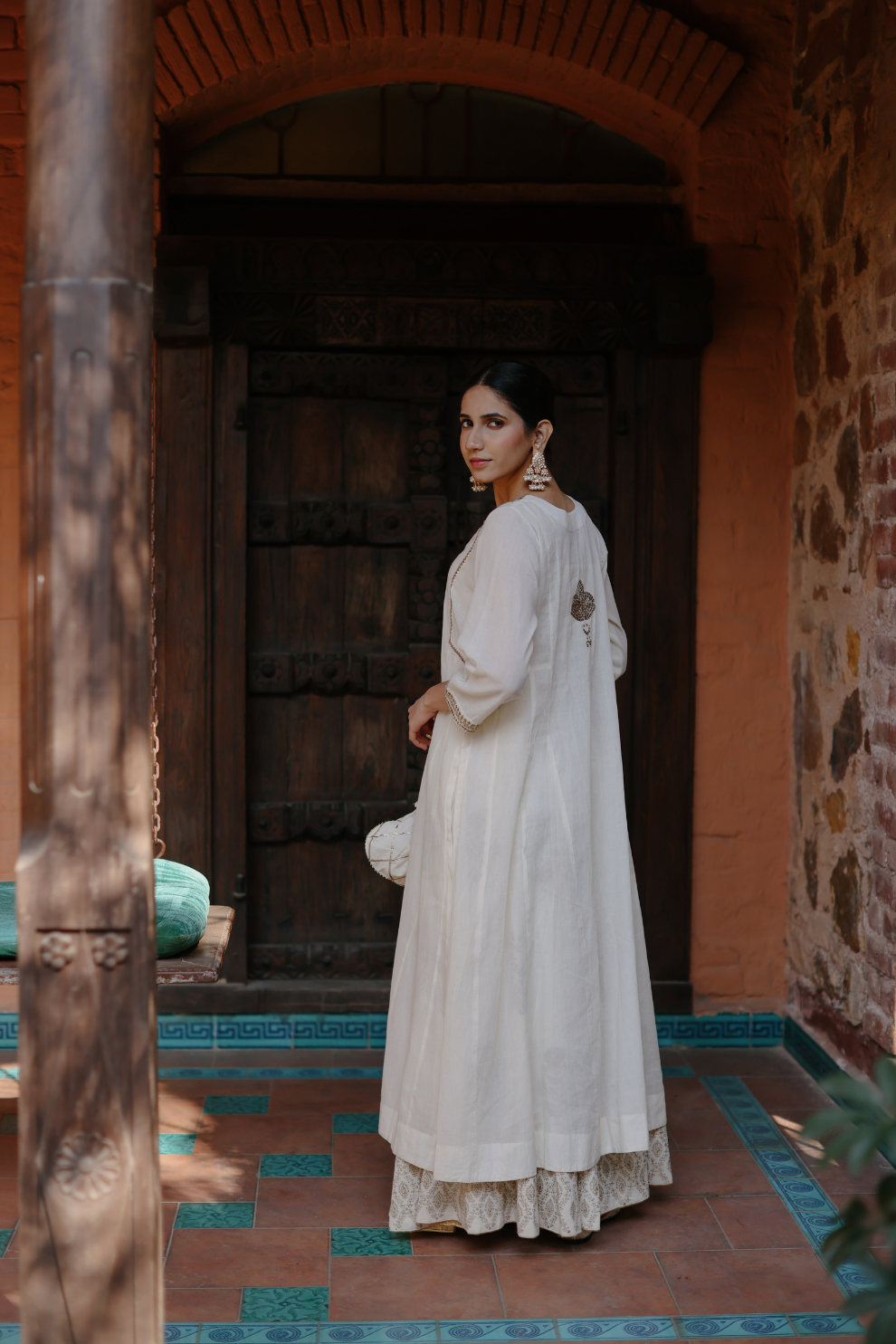 Kurta with zari embroidery on the yoke withnblock printed skirt