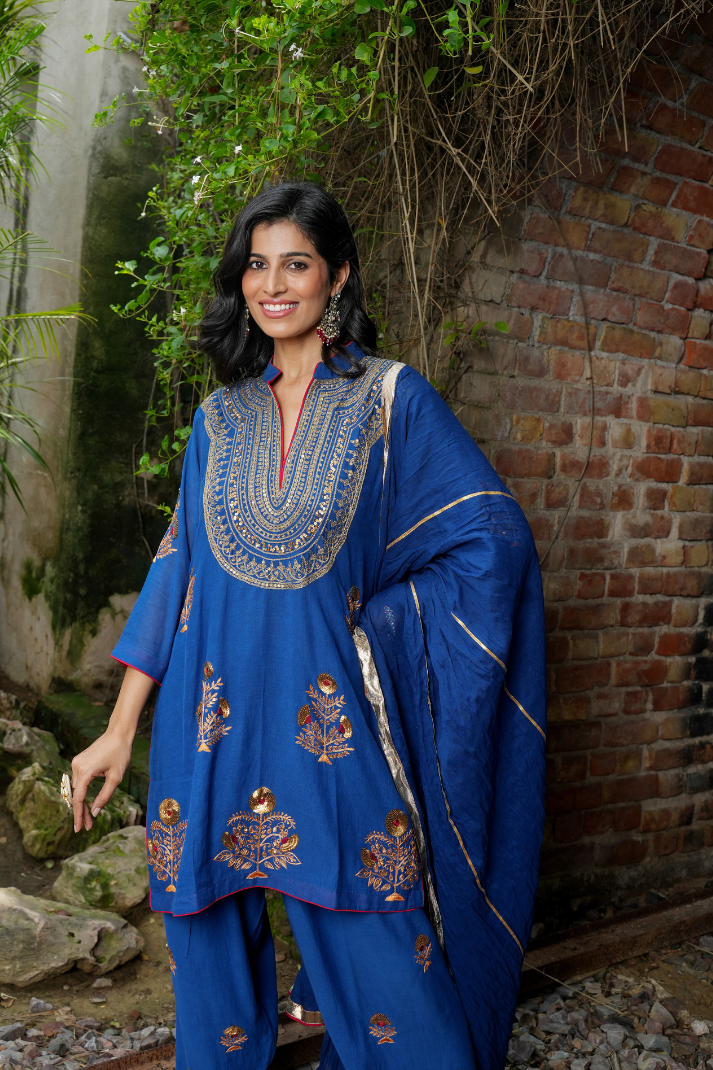 A blue kurta with zari embroidery pant