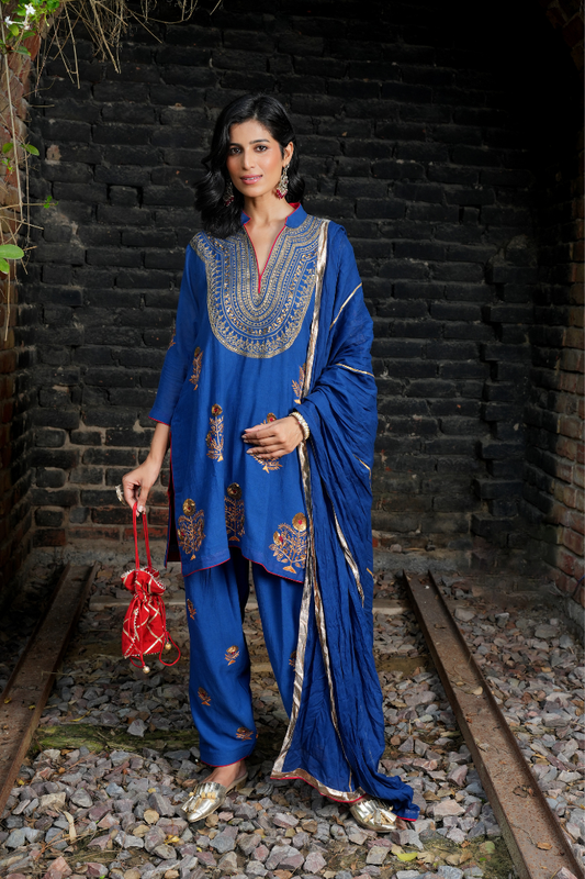 A blue kurta with zari embroidery pant