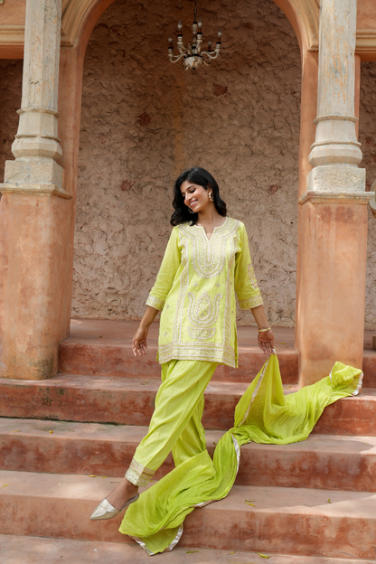 A vibrant lime-green kurta Paired with a flowy salwar