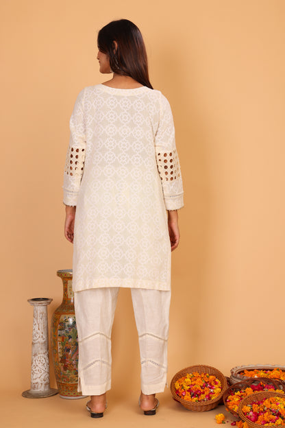 Off white textured kurta with lace detailing  and pants