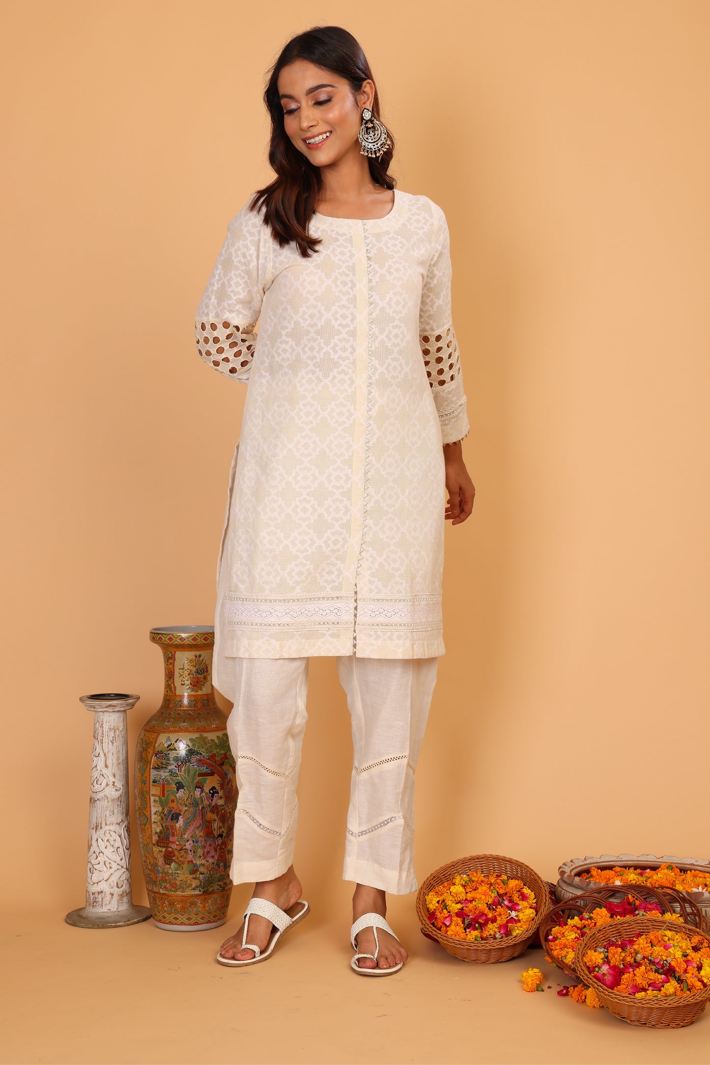 Off white textured kurta with lace detailing  and pants