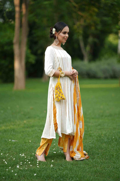 Kurta with embroidery and ikat pants and dupatta