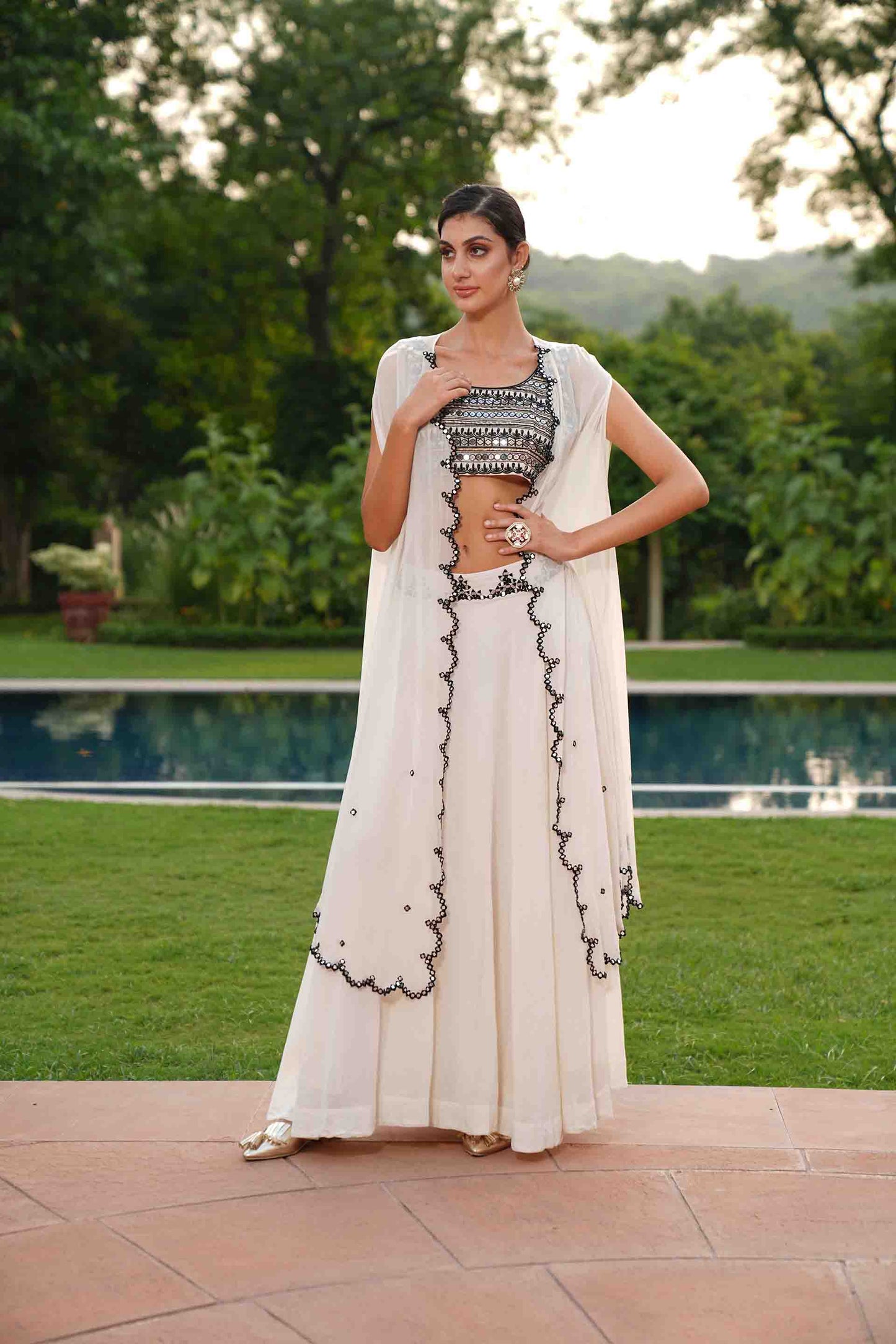 Mirror work lehenga with scallop cape