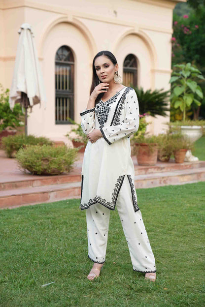 Ivory set with neckline embroidery in black