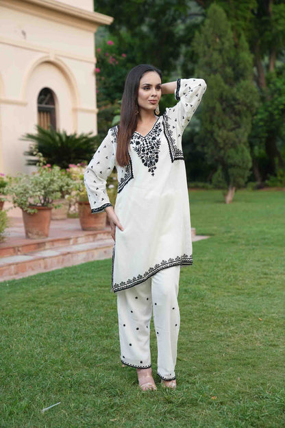 Ivory set with neckline embroidery in black