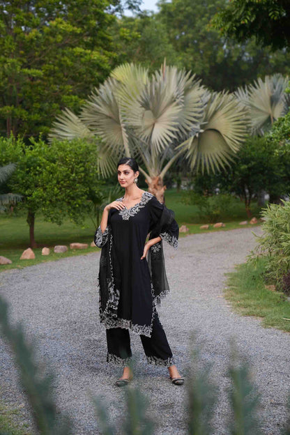 Black cutwork kurta with pants and dupatta