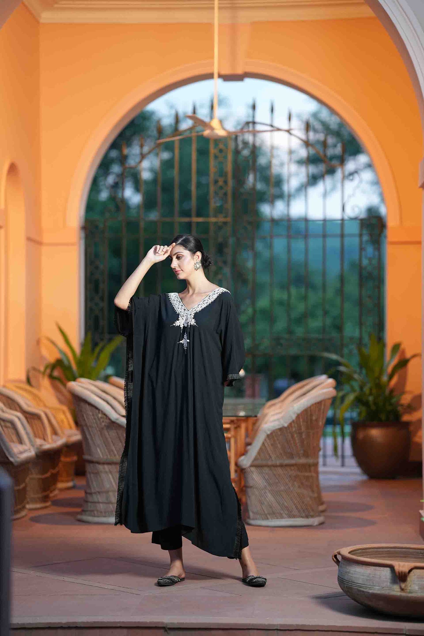 Black kaftan with golden embroidered neckline