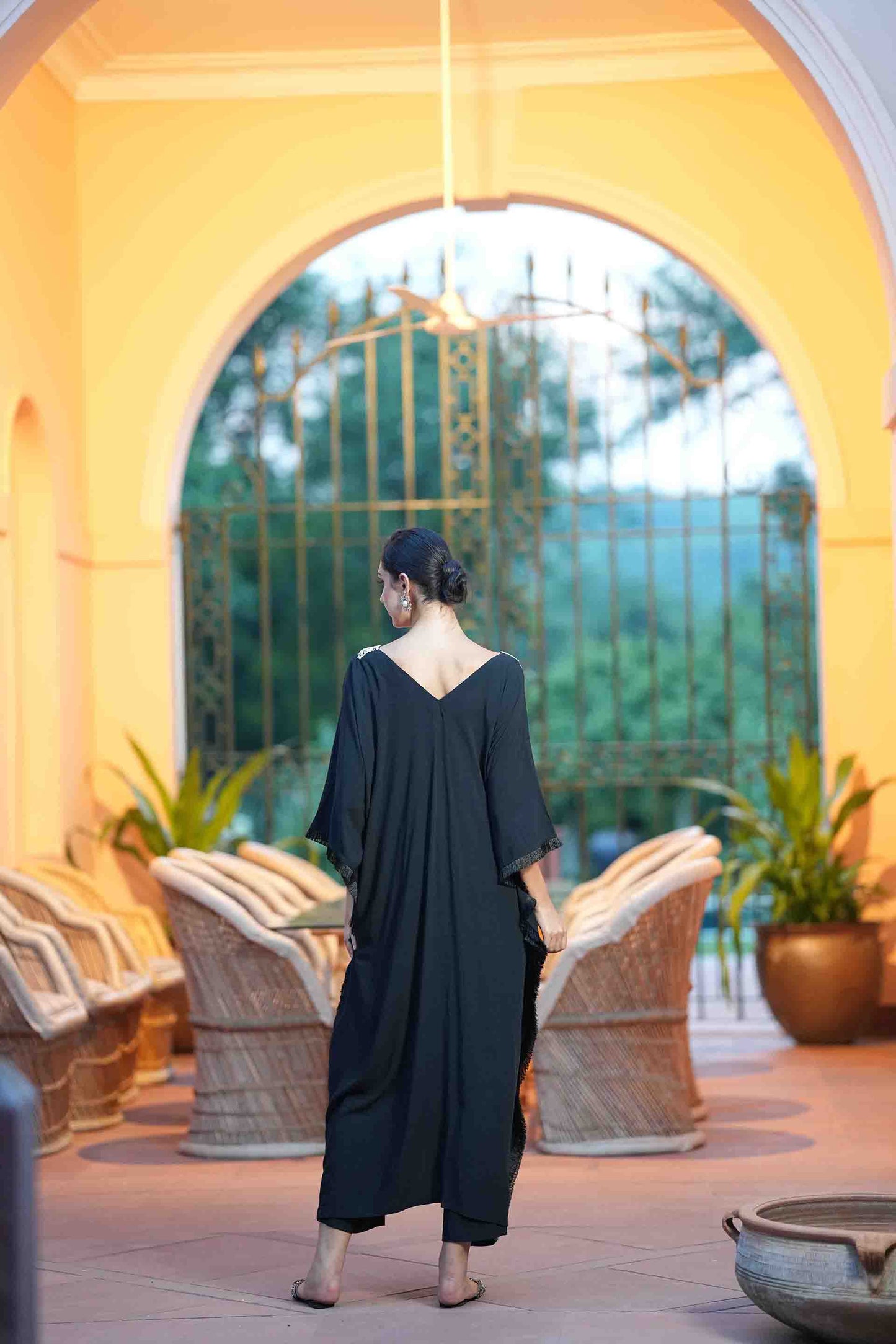 Black kaftan with golden embroidered neckline