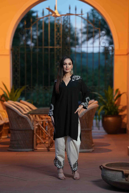 Black kurta with white embroidery and dhoti