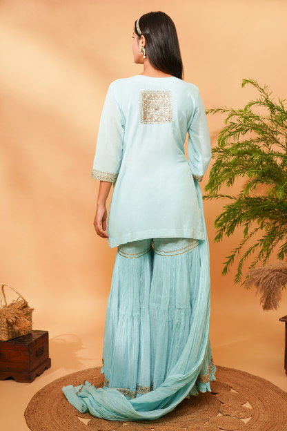 Blue short kurta with gota paired with garara and dupatta